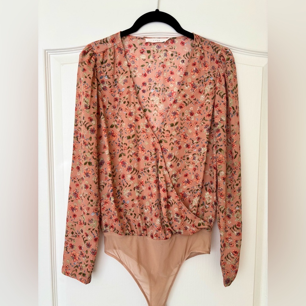 LUSH brand floral bodysuit.